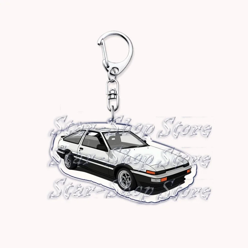 Silver acrylic keychain featuring an off-road truck design.