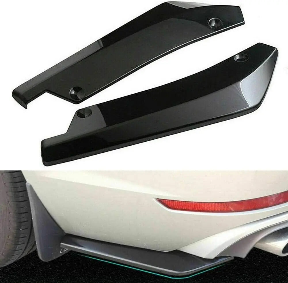 Black universal front bumper lip and side skirt kit installed on a white car's lower body.