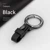 A black Yaelts leather keychain with a silver ring and black strap is shown on a white background.