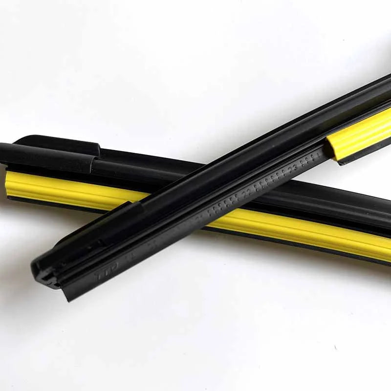 A pair of black and yellow universal windshield wiper blades shown diagonally against a white background.