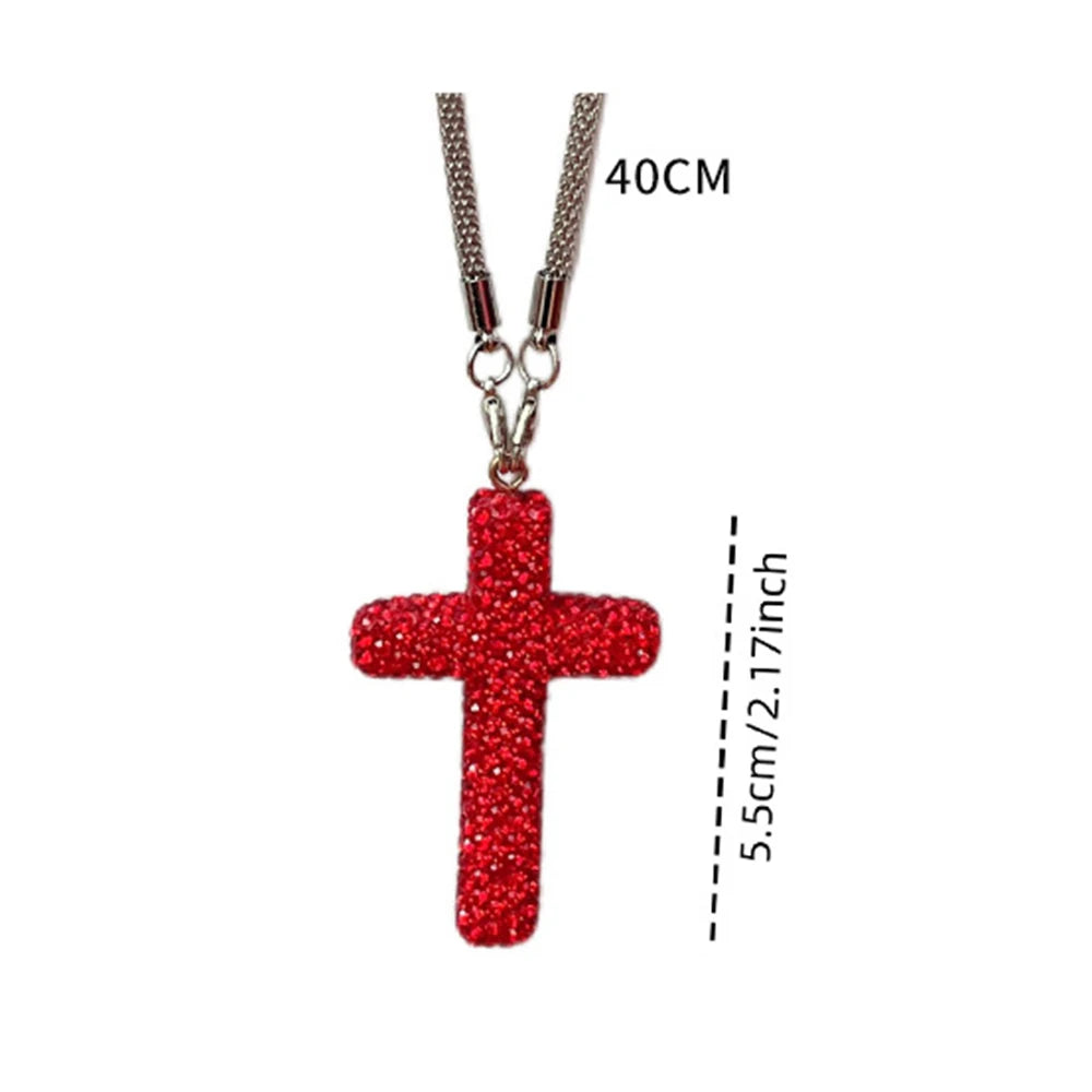Stainless steel cross ornament pendant with a red glitter finish and a silver chain.
