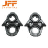 A pair of black aluminum ignition switch covers for electric dirt bikes.