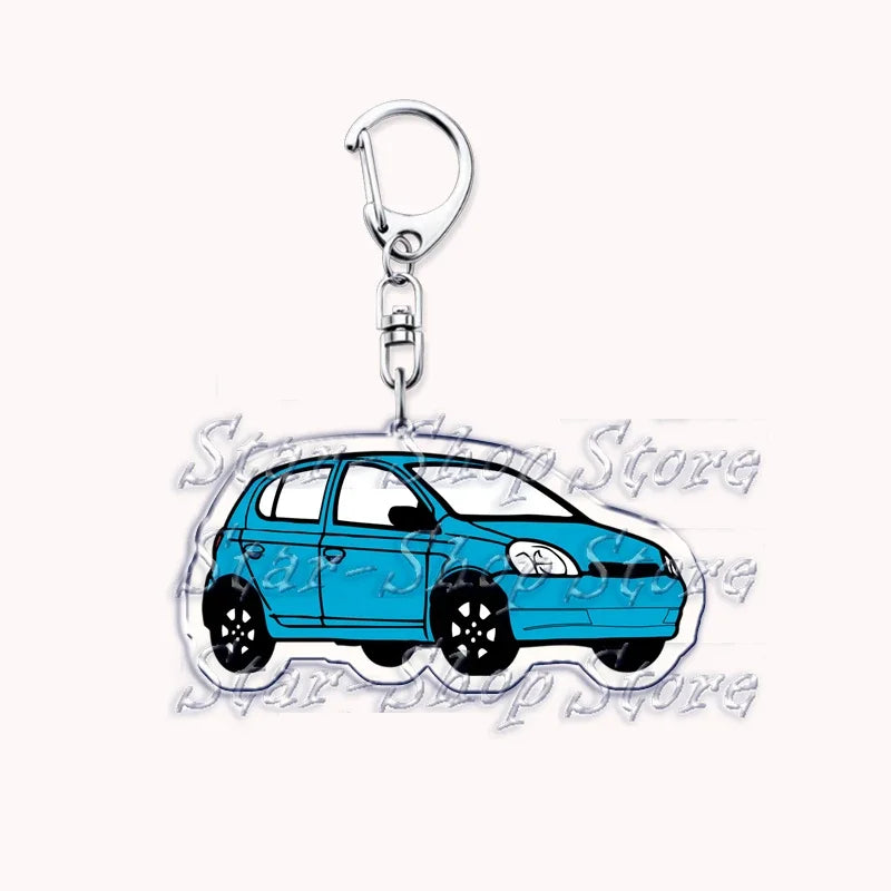 Silver acrylic keychain featuring a blue hatchback car.