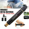 A black metal garden hose nozzle and spray kit is shown next to a car being washed.