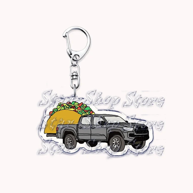 Acrylic keychain featuring a silhouette of a dark gray off-road truck.