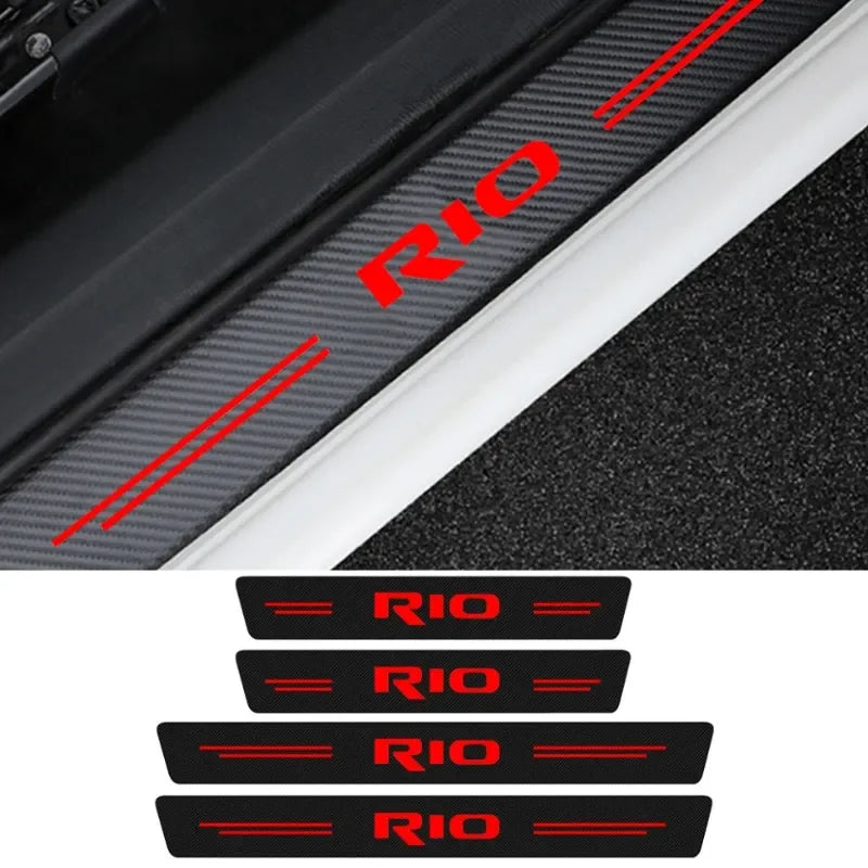 Black carbon fiber door threshold decals with red markings shown in close-up.