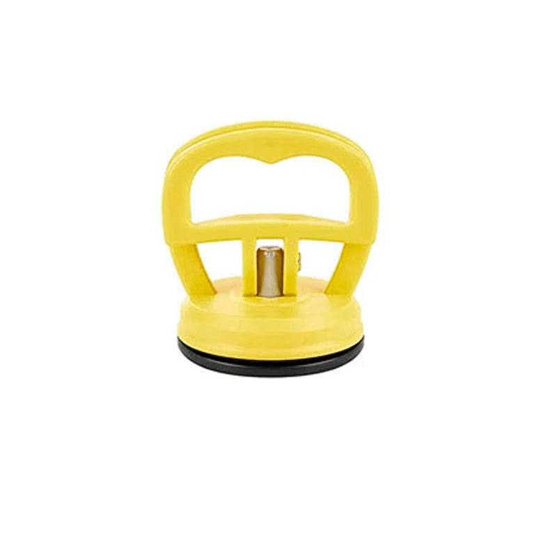 Yellow car dent remover puller with a handle and suction cup mechanism