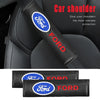 A black carbon fiber shoulder pad cover for a Ford car seat, featuring the Ford logo and red text.