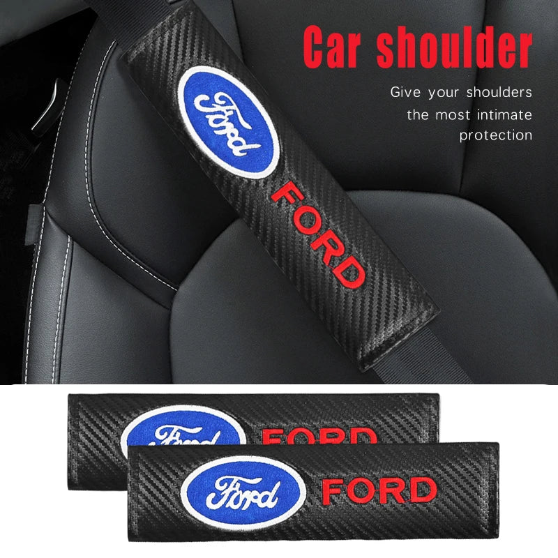 A black carbon fiber shoulder pad cover for a Ford car seat, featuring the Ford logo and red text.