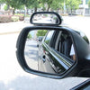Rétroviseurs convexes à large angle réglables montés sur la porte d'une voiture.