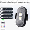 Lumière LED voiture sans fil rechargeable noire avec lentille translucide et télécommande.