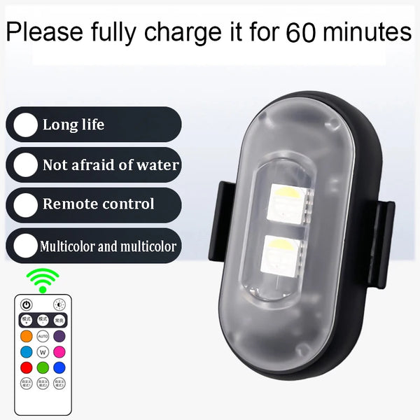 A black rechargeable wireless car LED light with a translucent lens and a remote control device shown next to it.