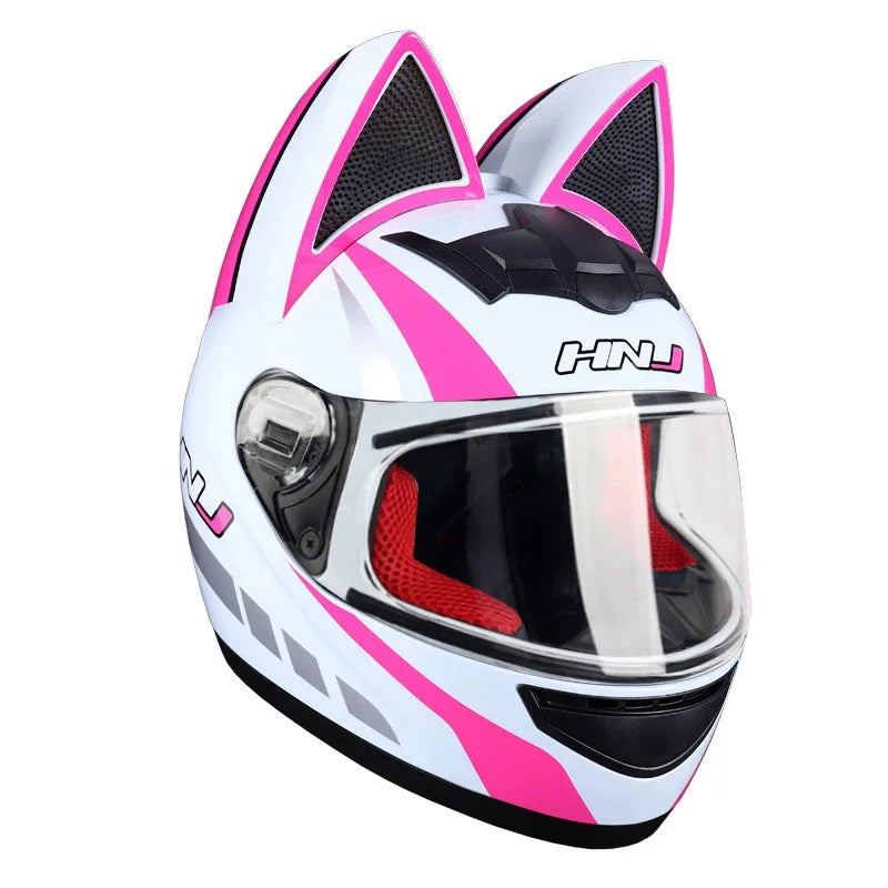 A white and pink cat-ear full face motorcycle helmet with a clear visor.