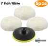 Five white wool polishing pads and a mounting screw for auto detailing