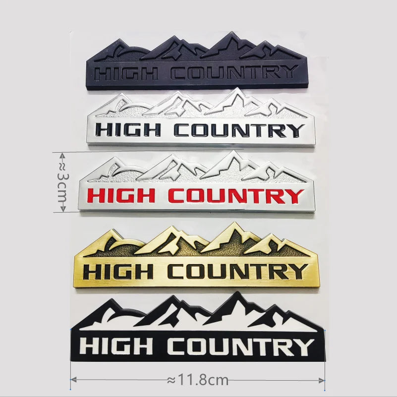 A set of five layered decals featuring mountain silhouettes and the text HIGH COUNTRY in black, silver, red, and gold.
