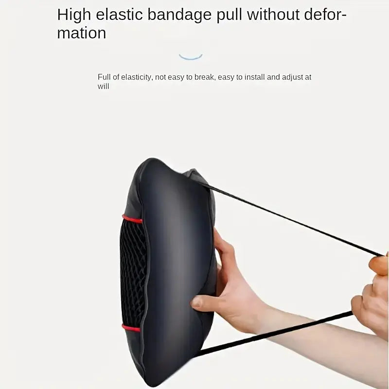 A hand is pulling a black neck support cushion, demonstrating its elastic bandage pull without deformation.