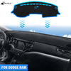 A custom fit dashboard mat for a Dodge Ram truck is shown, featuring an adjustable black cover.