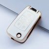 A white and gold durable TPU key fob case for Chevrolet and GMC vehicles shown in a diagonal angle.