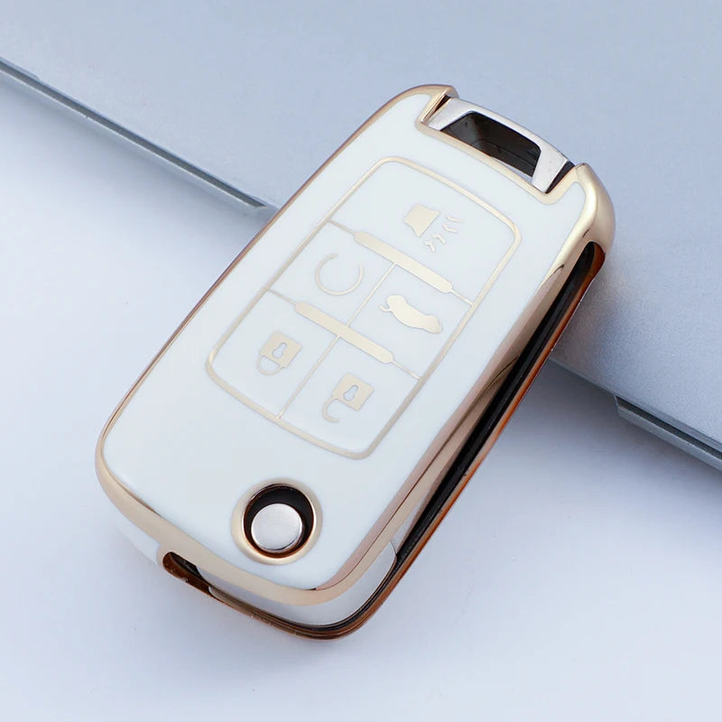 A white and gold durable TPU key fob case for Chevrolet and GMC vehicles shown in a diagonal angle.