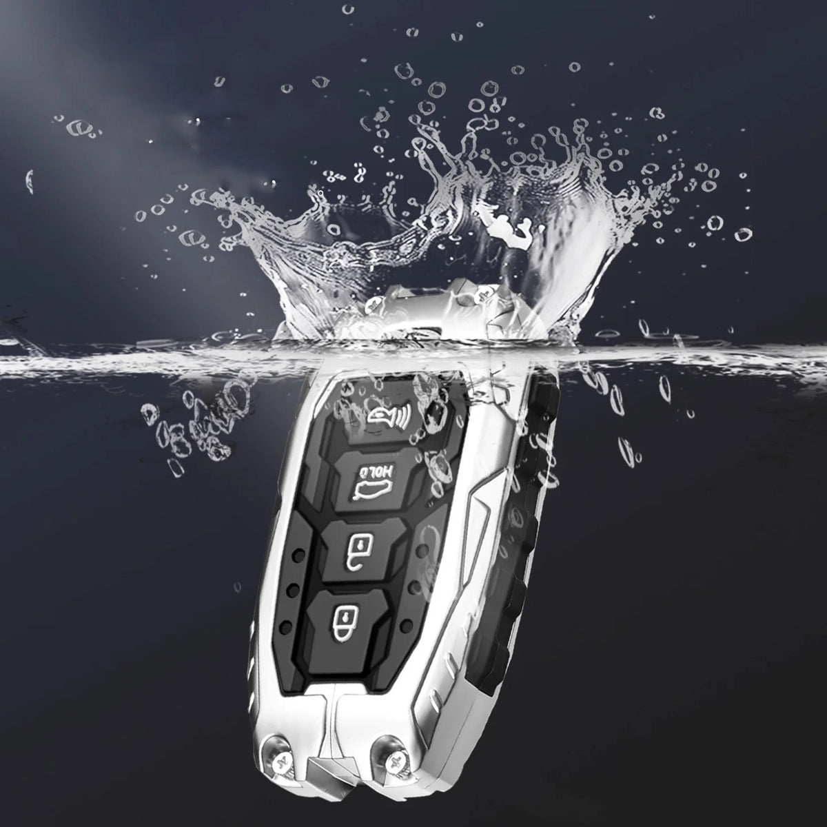 A silver car key fob cover is shown splashing water on a dark surface.