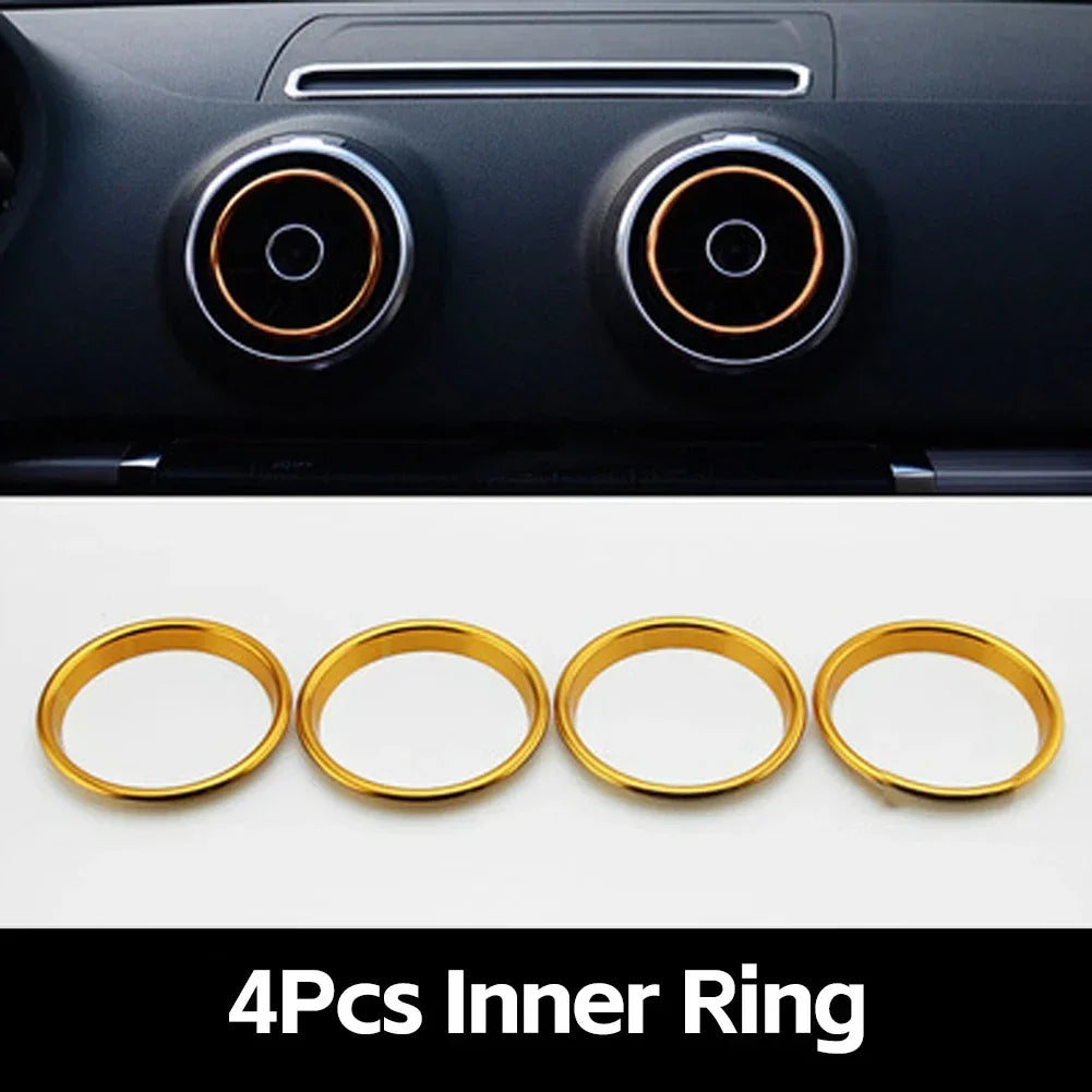 Four gold inner rings used as interior air vent trim covers for an Audi A3