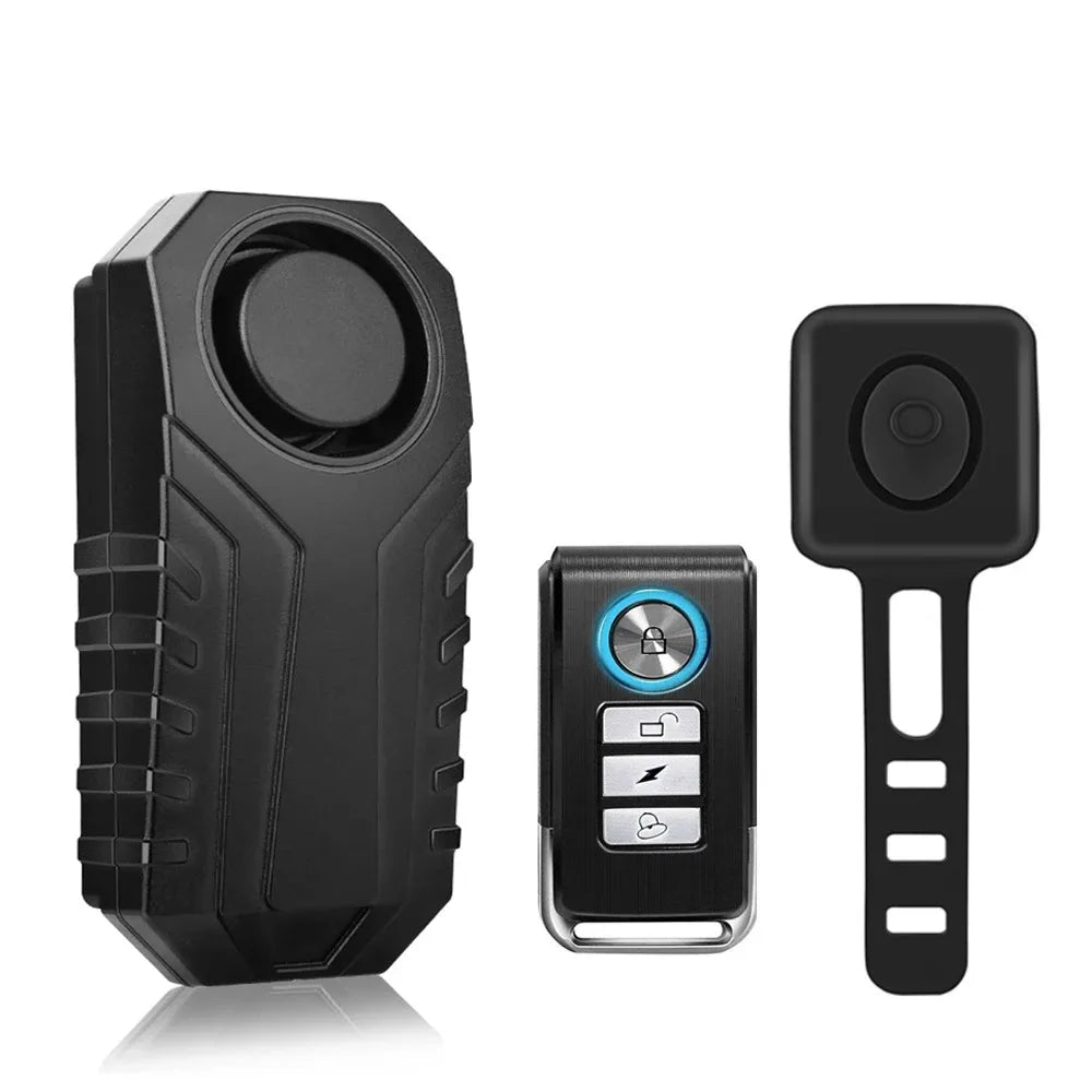 A black wireless bicycle and motorcycle alarm system consisting of a main unit and a remote trigger.