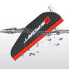 Black and red rain cover for a universal car rearview mirror being splashed by water.