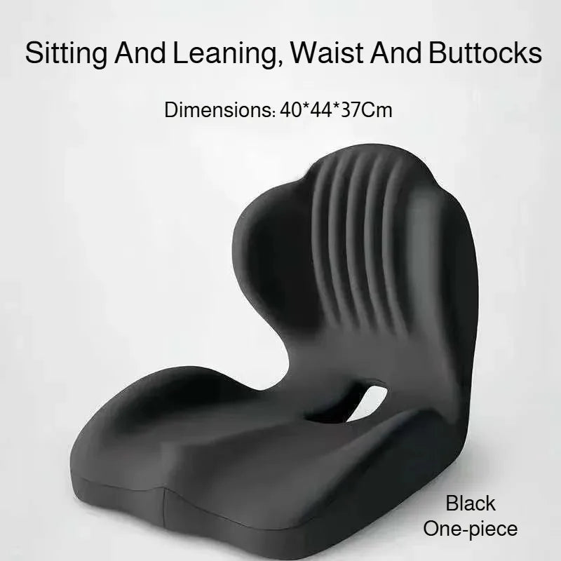Black ergonomic shell seat cushion designed for sitting and leaning with lumbar support.