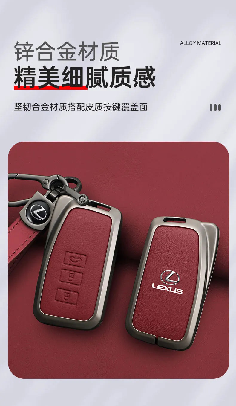 A close-up of a metallic Lexus car key cover shell in a matte red color resting on a dark red surface.
