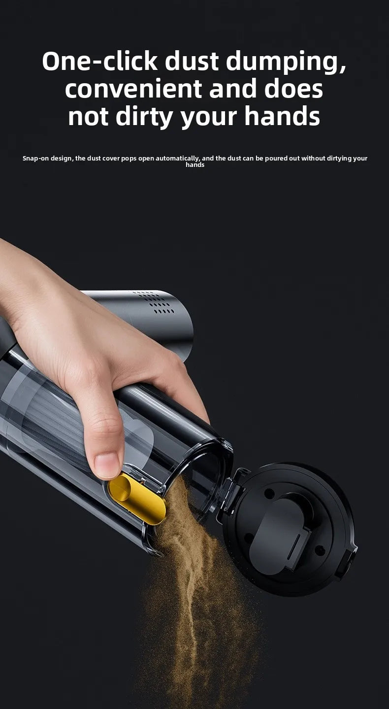 A hand is using a cordless handheld vacuum cleaner to dump dust into a container.