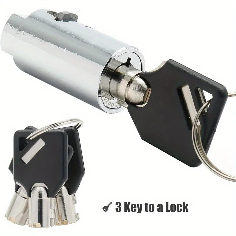 A silver security lock set featuring a cylindrical lock and three keys attached to a black padlock.