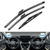 A set of complete wiper blades for a Subaru Forester, shown alongside a steering wheel interior.