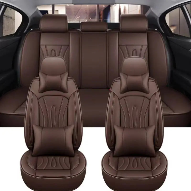A set of brown premium PU leather car seat covers shown in the interior of a vehicle.