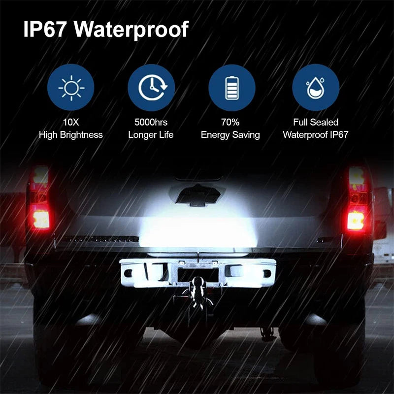 High-intensity LED license plate lights installed on a dark truck, demonstrating IP67 waterproof and brightness features.