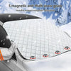 A silver car windshield is covered with a textured, anti-theft snow gear protector featuring five magnetic adhesive grips.