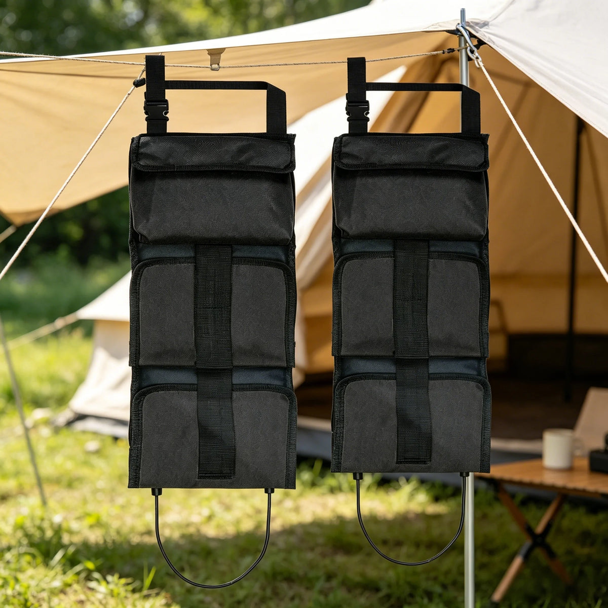 A black tactical rifle sling organizer with multi-pocket storage hanging from a tent pole.