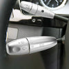 Close-up view of replacement Wiper Shift Lever Covers for a Mercedes S-Class vehicle interior.