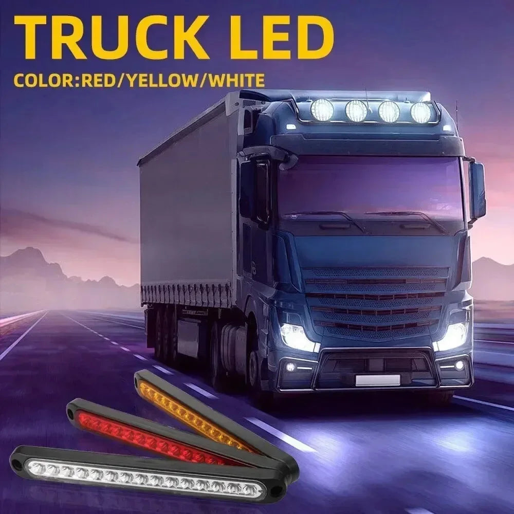 Truck led light bar with red yellow and white lights mounted on a truck cab in a purple twilight setting