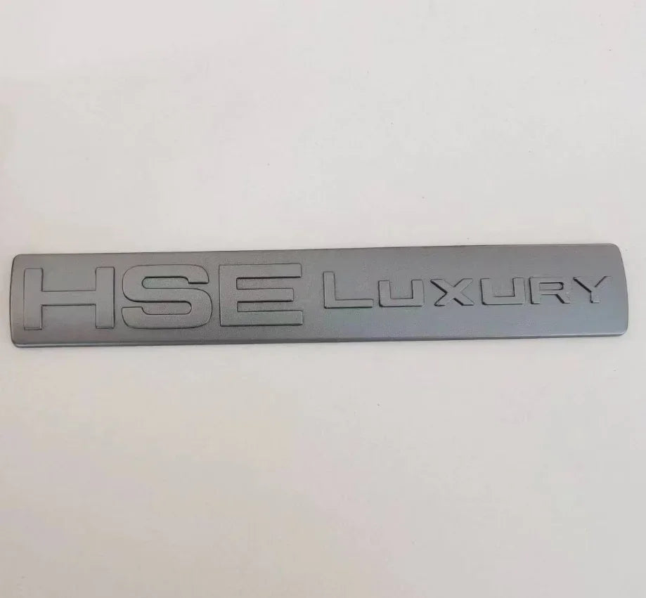 Silver HSE LUXURY badge decal for a Discovery 4 car.