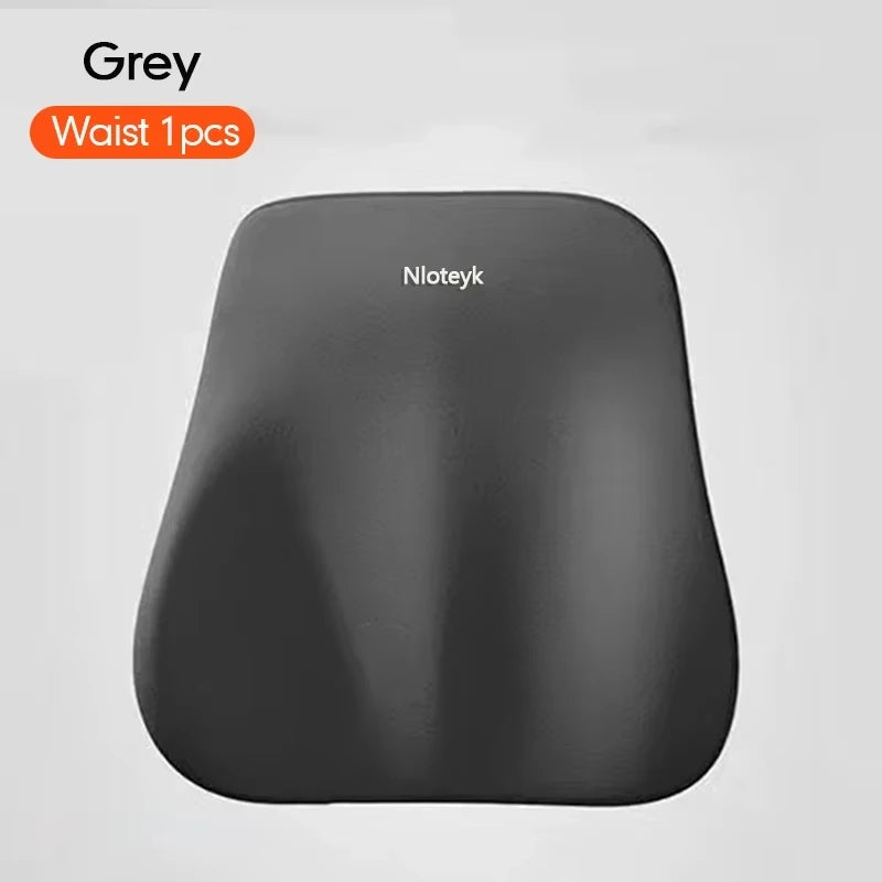 A grey ergonomic lumbar support pillow shown in a frontal view.