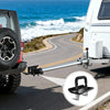 A close-up view of a heavy duty trailer anti-rattle stabilizer lock mounted on a vehicle hitch.