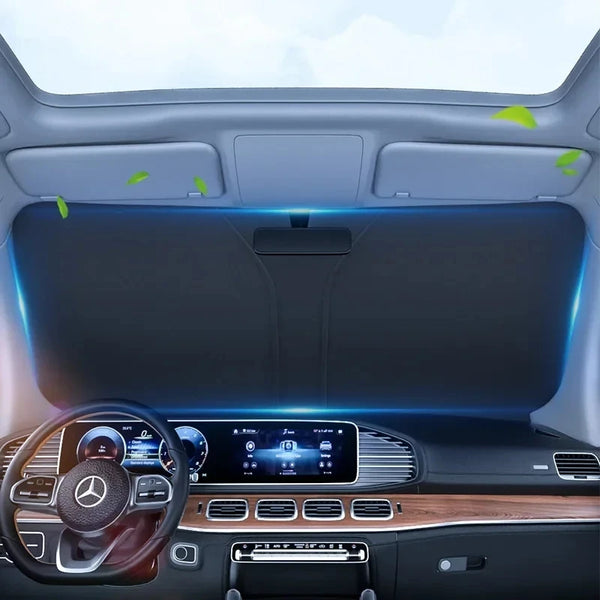 Interior view of a car showing a deployed universal sunshade covering the windshield.