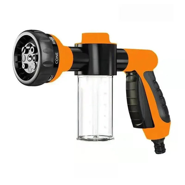 An orange and black high pressure foam lance car wash sprayer with a clear cylindrical bottle.