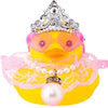 A decorative rubber duck in yellow with a crown and pink accessories.