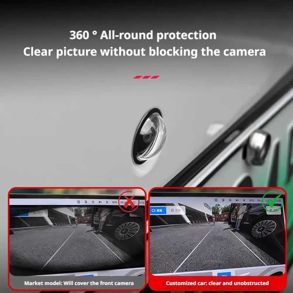 A close-up view of a clear camera lens protector being applied to a car's exterior.
