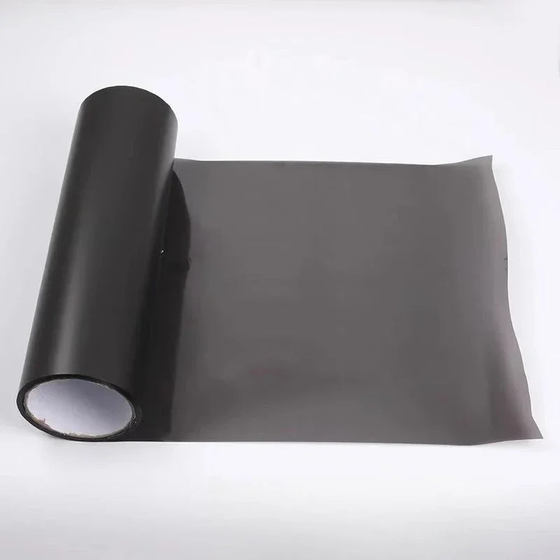 Roll of dark gray tint film for car headlights and taillights