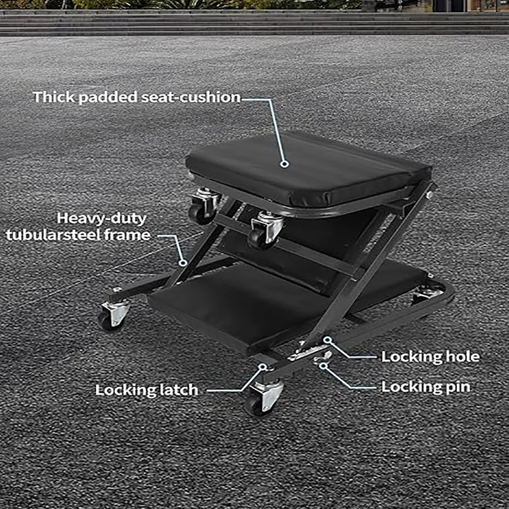 A black foldable garage creeper seat with a thick padded cushion and heavy-duty tubular steel frame.