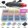 A black heat shrink wire terminal kit with an EU plug and various quantities of terminals in plastic trays.