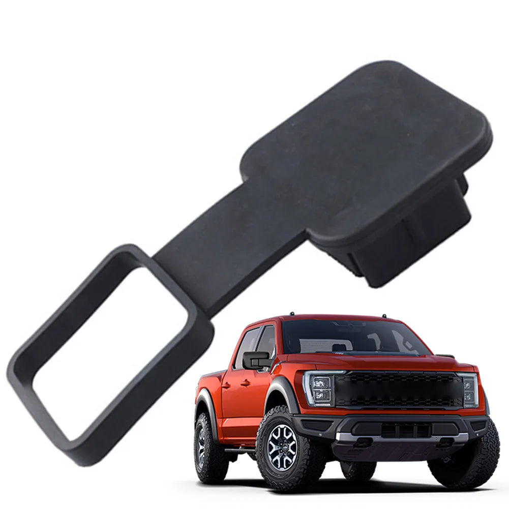 Black universal trailer hitch receiver cover attached to an orange off-road vehicle.