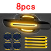 Eight reflective yellow and blue stickers designed to protect car door handles.